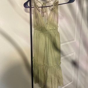 Green strappy dress. Size medium. Never worn. Light material.